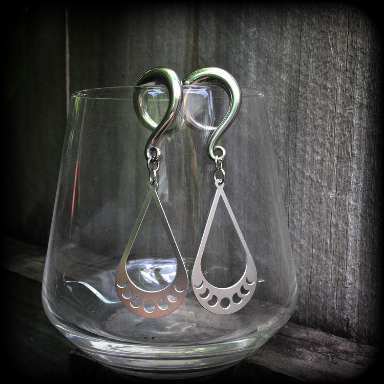 These gorgeous earrings feature stainless steel tear drop moon phase charms, measuring just on 7cms from tip to tip, and weighing only 8 grams each, not too heavy.

These gauged earrings have been made on 2 gauge (6mm) surgical steel full curl hooks, to be worn in stretched lobes.