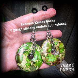 Featuring lime green ocean jasper donut gemstones, these earrings weigh in at approx 35 grams a piece, and hang just on 10cms from tip to tip.
This pair has been made with large antique silver shephard hooks, for stretched ears.