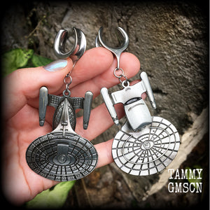 These awesome Star Trek USS Enterprise ear hangers feature a gorgeous big pewter Enterprise pendant, measuring just over 9cms from tip to tip, and weighing approx 37 grams each, nice and heavy.

This pair has been made on 5/8" gauge (16mm) surgical steel cradles, to be worn in stretched lobes.
