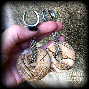 Featuring a pair of gorgeous streaky picture jasper donut gemstones cradled in sturdy stainless steel chain links, these gauged earrings weigh approx 32 grams a piece and measure just under 10cms from tip to tip.

This pair have been made on 3/4" gauge (19mm) surgical steel cradles, suitable for stretched lobes.