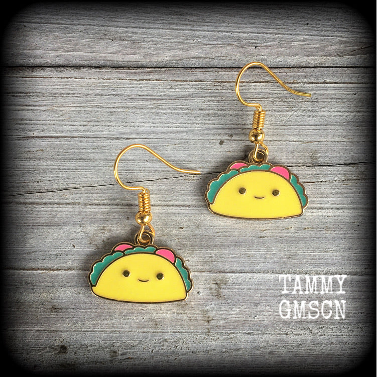 This adorable pair of earrings features cute little happy taco charms, measuring approx 3cms from tip to tip and weighing only a few grams each. These earrings are too cute!

This pair has been made on antique gold french hooks, for pierced ears.