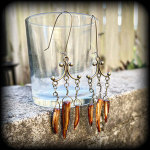 Antique bronze and shell tusk earrings