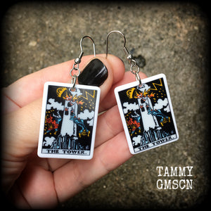 This pair of earrings features a classic Rider Waite ‘The Tower’ acrylic tarot card, measuring just over 6cms from tip to tip, and weighing only a gram or two each.

This pair has been made with stainless steel french hooks, for pierced ears.