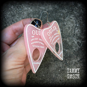 These gorgeous oversize pastel goth acrylic planchette earrings are big and dangly, weighing in at 8 grams each and measuring just under 8cms from tip to tip.

This pair have been made on stainless steel french hooks, suitable for pierced ears.