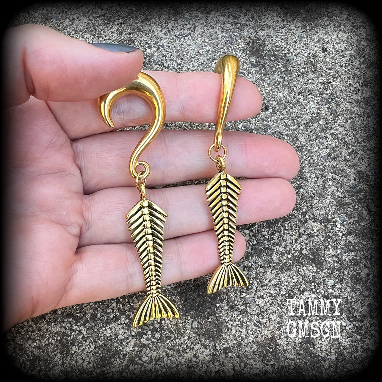 Skeletal mermaid tail gauged earrings
