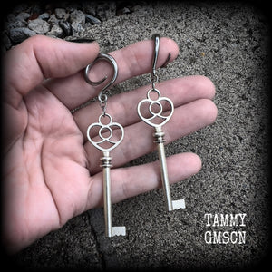 Antique silver key gauged earrings