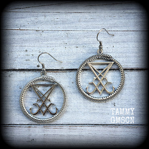 These gorgeous antique silver 'Ouroboros and Sigil of Lucifer' earrings are light weight at approx 5 grams a piece, and nice and dangly, measuring just over 5cms from tip to tip.
This pair has been made with stainless steel french hooks, suitable for pierced ears.
