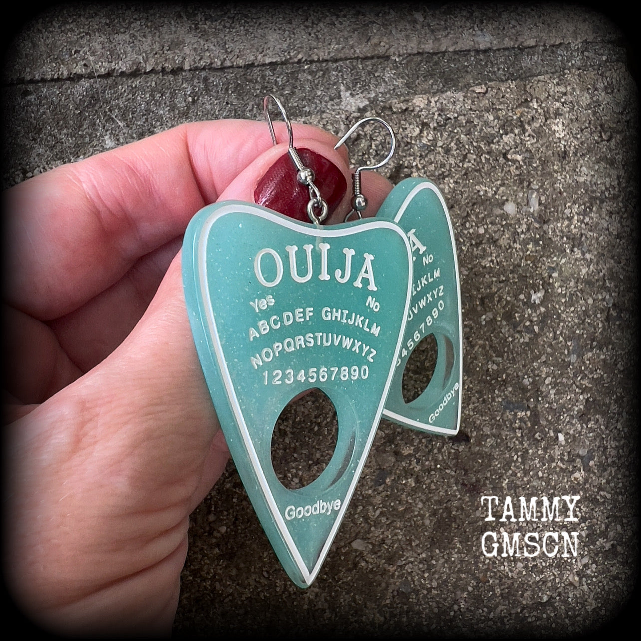 These gorgeous oversize baby blue pastel goth planchette earrings are big and dangly!!!
Weighing in at 8 grams each and measuring just under 8 cms from tip to tip.

This pair of earrings have been made on stainless steel french hooks, suitable for pierced ears.