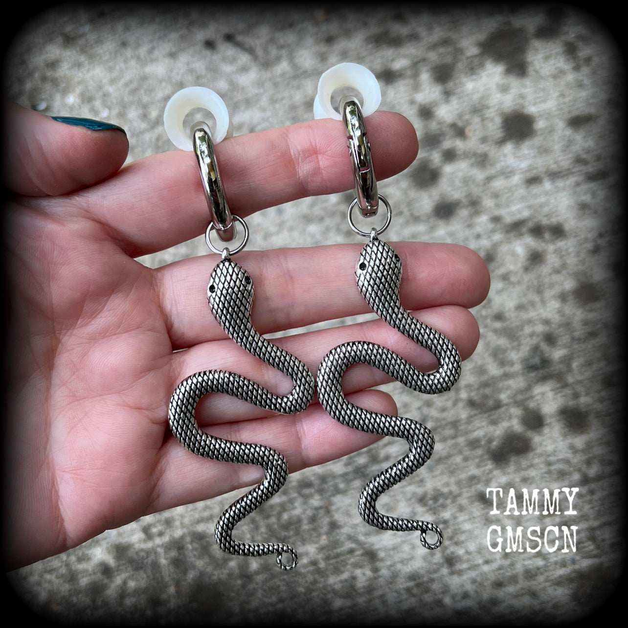 Silver snake gauged hoop earrings-Snap rings