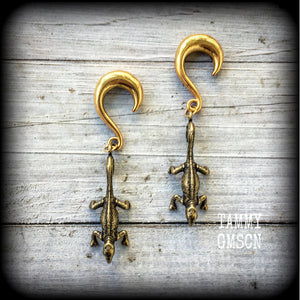 These earrings are brass chameleon lizards hanging by their tail, pictured here with our half curl hooks. Choose from 4 different style hooks for lobes stretched up to 30mm.