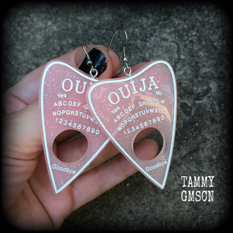 These gorgeous oversize pastel goth acrylic planchette earrings are big and dangly, weighing in at 8 grams each and measuring just under 8cms from tip to tip.

This pair have been made on stainless steel french hooks, suitable for pierced ears.
