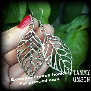 These beautiful earrings feature an antique silver skeleton leaf, measuring just on 7cms from tip to tip, and weighing approx 6 grams each.
This pair have been made on stainless steel french hooks, suitable for pierced ears.