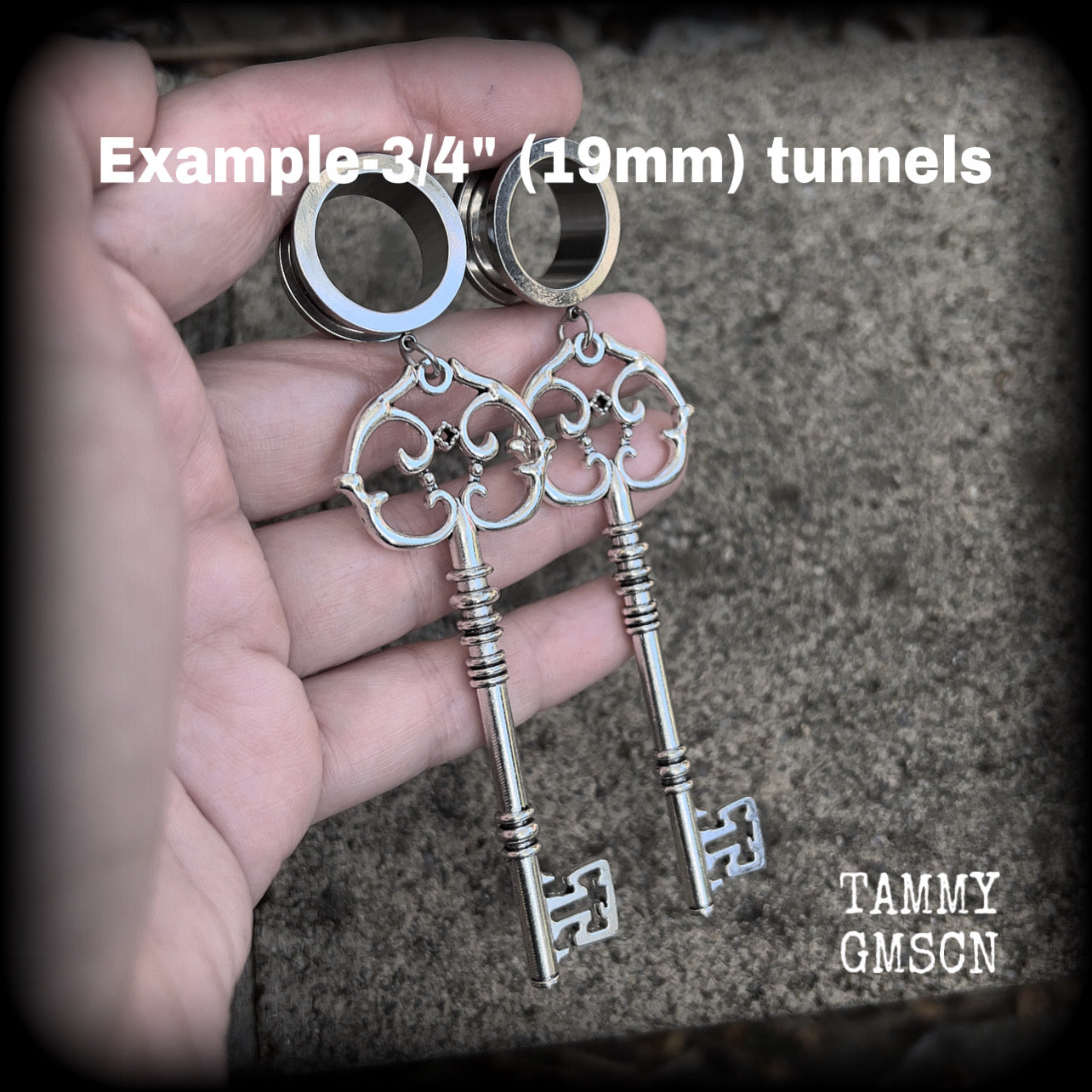 Antique silver key tunnel earrings
