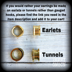 Crescent moon tunnel earrings 