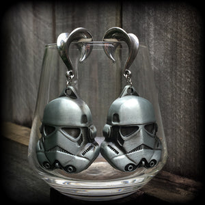 Measuring approx 8cms from tip to tip, these Storm Trooper ear hangers are nice and big, and nice and dangly, weighing around 26 grams each.

This pair has been made on 5/8" gauge (16mm) surgical steel saddles, suitable for stretched lobes.