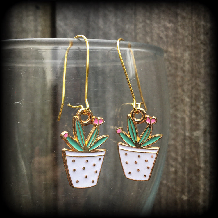 Cactus earrings Succulent earrings Aloe vera earrings Snake plant Crazy plant people Pierced ears Ear gauges Ear hangers Tunnels Plugs Green CIPPA earrings Cactus jewelry Desert earrings Trailer trash jewelry Retro earrings Kitsch earrings
