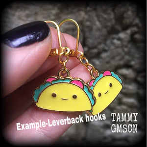 This adorable pair of earrings features cute little happy taco charms, measuring approx 3cms from tip to tip and weighing only a few grams each. These earrings are too cute!

This pair has been made on antique gold leverback hooks, for pierced ears.