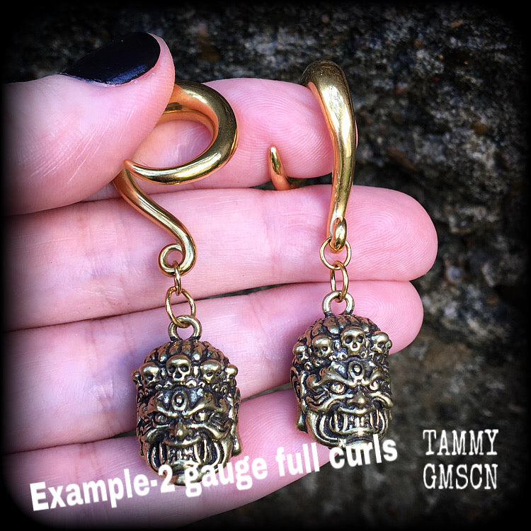 These gauged earrings have been made for stretched lobes featuring a classic Japanese warrior demon face. These are available on  four different style hooks from 6mm up to 30mm.