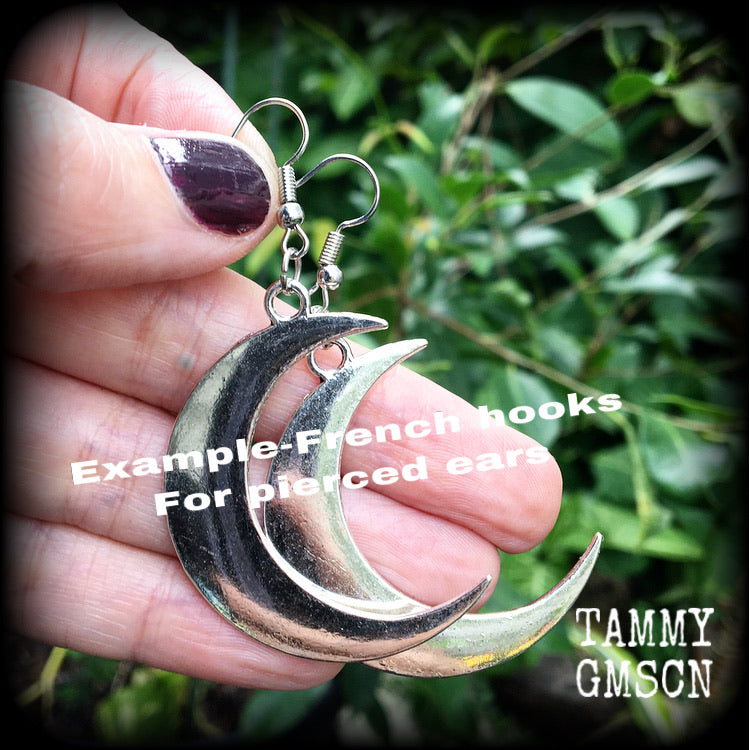 Crescent moon tunnel earrings