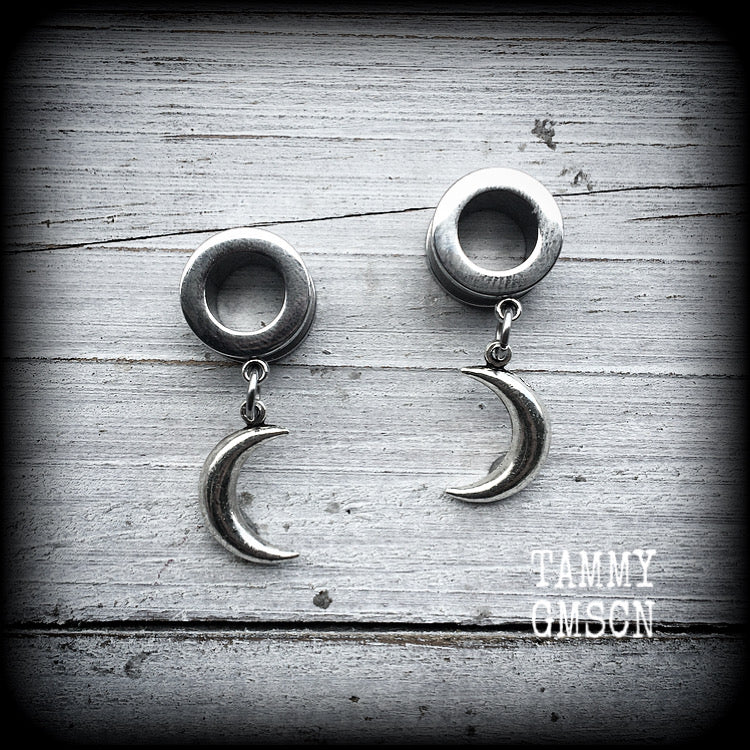 Crescent moon tunnel earrings 