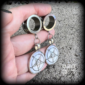 These gorgeous tunnel earrings feature classic black Sigil of Baphomet symbols on white background enclosed in resin, weighing in at approx 15 grams each and measuring just over 7 cms from tip to tip.

This pair have been made with 3/4" gauge (19mm) surgical steel screw fit tunnels, suitable for stretched lobes.