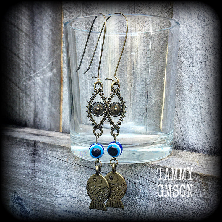 Evil eye and medieval fish earrings