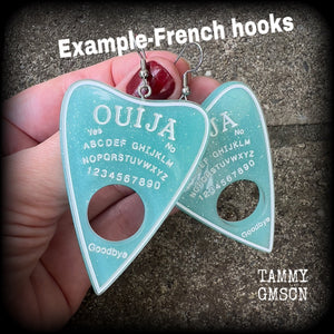 These gorgeous oversize baby blue pastel goth planchette earrings are big and dangly!!!
Weighing in at 8 grams each and measuring just under 8 cms from tip to tip.

This pair of earrings have been made on stainless steel french hooks, suitable for pierced ears.