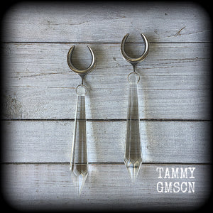 These gorgeous dangly glass earrings have been made with gorgeous faceted clear glass spears, measuring 13 cms from tip to tip, and weighing approx 13 grams each.

These earrings have been made on 3/4" gauge (19mm) surgical steel cradles, to be worn in stretched lobes.