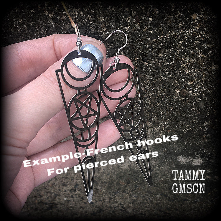 These earrings feature gorgeous esoteric crescent moon and pentagram designs, are super light weight and nice and dangly, weighing only a gram or two each, and measuring just over 9cms from tip to tip.
This pair has been made with stainless steel french hooks, to be worn through pierced ears.