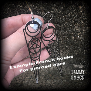 These earrings feature gorgeous esoteric crescent moon and pentagram designs, are super light weight and nice and dangly, weighing only a gram or two each, and measuring just over 9cms from tip to tip.
This pair has been made with stainless steel french hooks, to be worn through pierced ears.