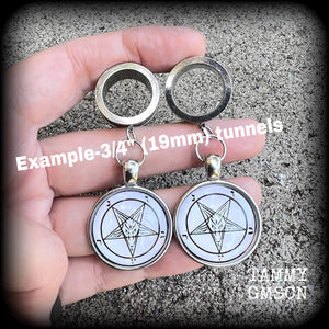 These gorgeous tunnel earrings feature classic black Sigil of Baphomet symbols on white background enclosed in resin, weighing in at approx 15 grams each and measuring just over 7 cms from tip to tip.

This pair have been made with 3/4" gauge (19mm) surgical steel screw fit tunnels, suitable for stretched lobes.