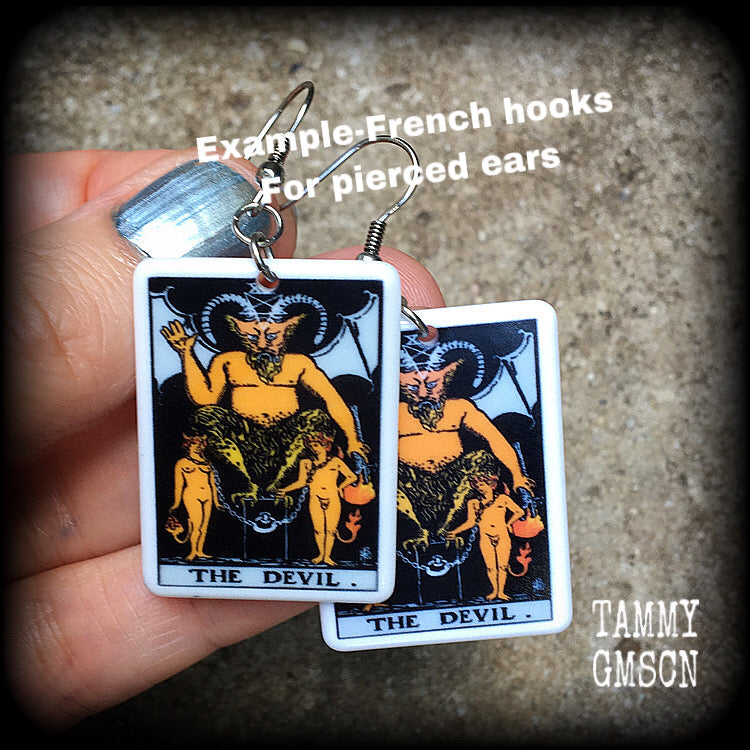 These earrings feature a lightweight Rider Waite ‘The Devil’ tarot card charm, measuring just over 6cms from tip to tip and weighing only a few grams each.

This pair has been made with stainless steel french hooks, for pierced ears.
