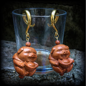 Carved wood pig earrings-Gauged earrings