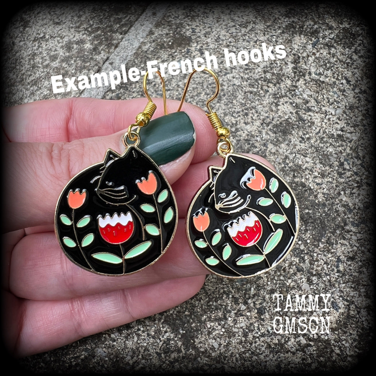 These quirky earrings and feature gorgeous folk art inspired black cat and tulip charms.
These earrings are nice and lightweight at only 4 grams, and measure just on 5cms from tip to tip.
This pair has been made with antique gold french hooks, to be worn in pierced ears.