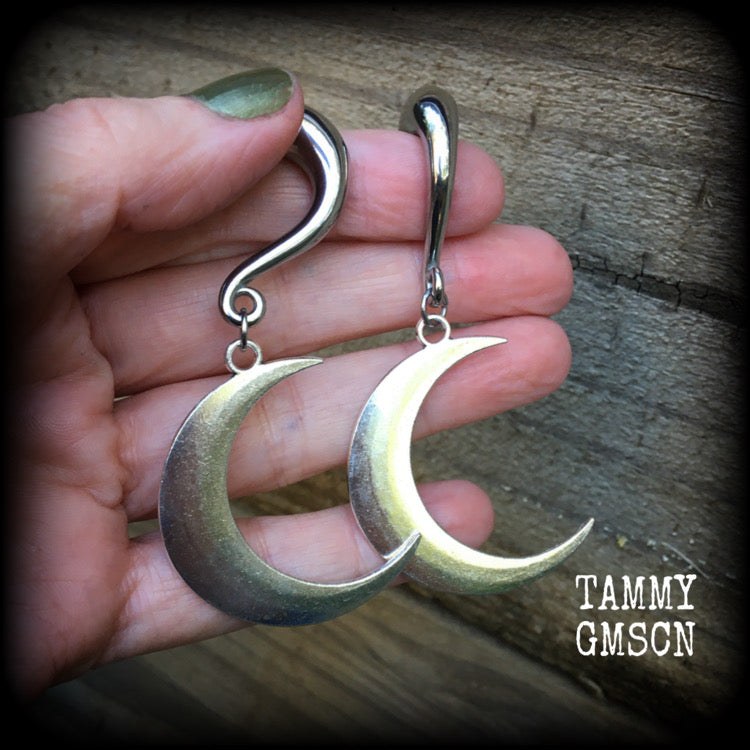 These gorgeously witchy antique silver 'Crescent moon' gauged earrings feature a classic antique silver crescent moon, measuring just under 8cms from tip to tip, and weighing approx 15 grams each.

This pair has been made on 0 gauge (8mm) surgical steel half curl hooks, to be worn in stretched lobes.