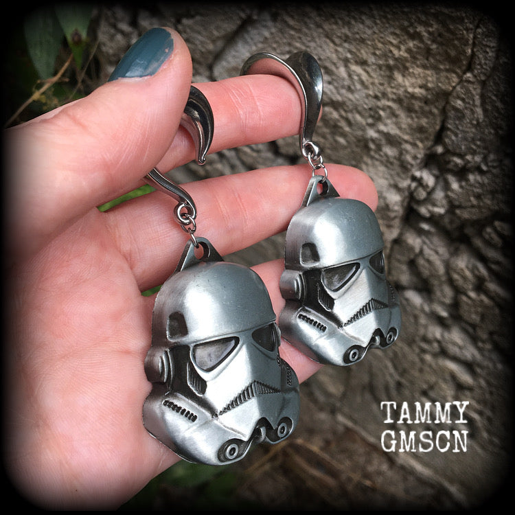 Measuring approx 8cms from tip to tip, these Storm Trooper ear hangers are nice and big, and nice and dangly, weighing around 26 grams each.

This pair has been made on 5/8" gauge (16mm) surgical steel saddles, suitable for stretched lobes.