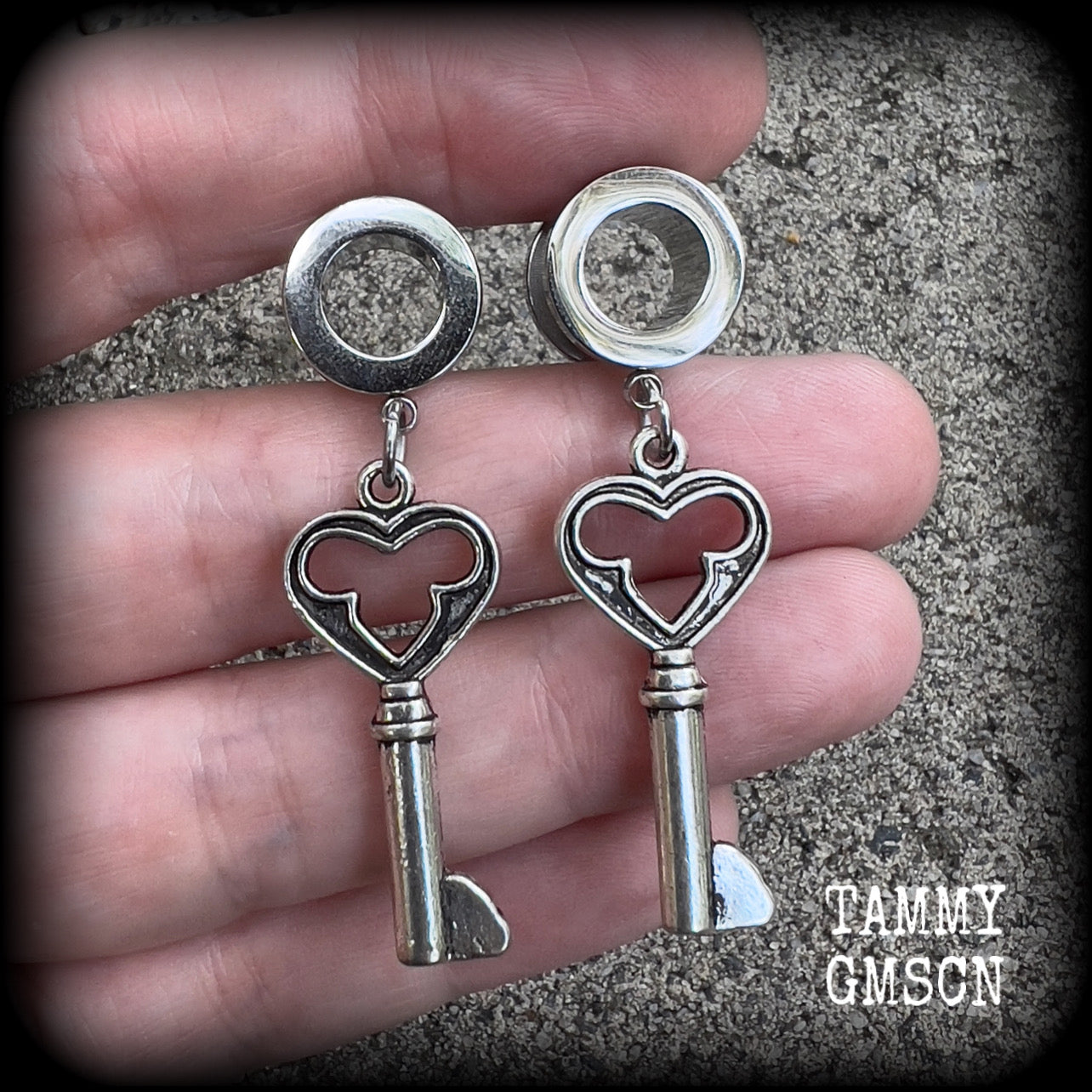 Antique silver key tunnel earrings