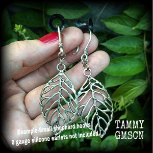 These beautiful earrings feature an antique silver skeleton leaf, measuring just on 7cms from tip to tip, and weighing approx 6 grams each.
This pair have been made on antique silver small shephard hooks, suitable for stretched ears.