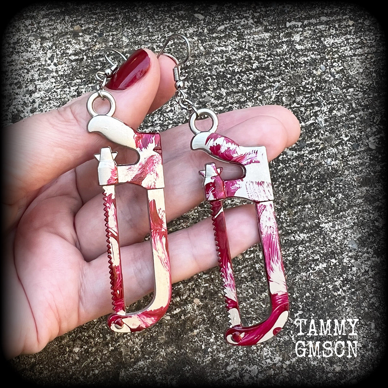 Bone saw earrings Hack saw earrings Halloween earrings Murder weapon True crime earrings Blood spatter Horrorpunk earrings Haooror punk jewelry Horror movies Slasher movies Pierced ears Ear gauges Mortuary equipment Medical instruments Zombie earring