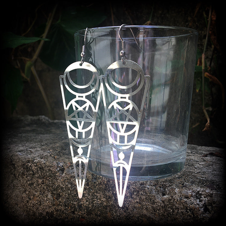 These earrings feature gorgeous esoteric crescent moon and pentagram designs, are super light weight and nice and dangly, weighing only a gram or two each, and measuring just over 9cms from tip to tip.
This pair has been made with stainless steel french hooks, to be worn through pierced ears.
