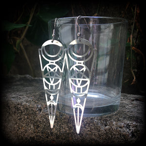 These earrings feature gorgeous esoteric crescent moon and pentagram designs, are super light weight and nice and dangly, weighing only a gram or two each, and measuring just over 9cms from tip to tip.
This pair has been made with stainless steel french hooks, to be worn through pierced ears.