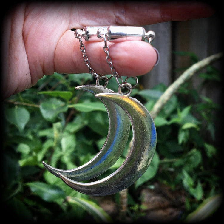 Crescent moon tunnel earrings