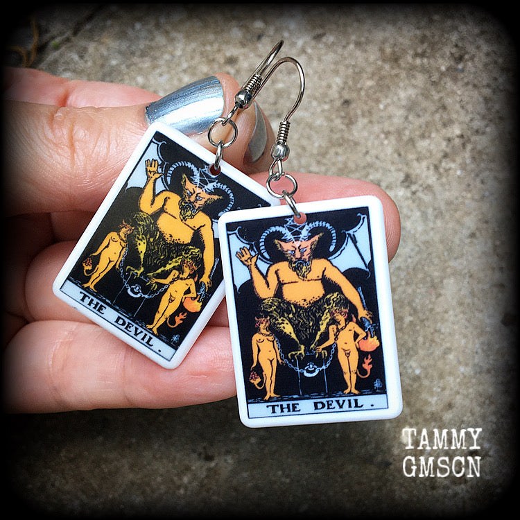 These earrings feature a lightweight Rider Waite ‘The Devil’ tarot card charm, measuring just over 6cms from tip to tip and weighing only a few grams each.

This pair has been made with stainless steel french hooks, for pierced ears.