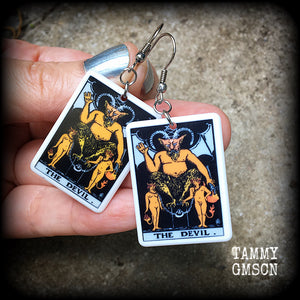 These earrings feature a lightweight Rider Waite ‘The Devil’ tarot card charm, measuring just over 6cms from tip to tip and weighing only a few grams each.

This pair has been made with stainless steel french hooks, for pierced ears.
