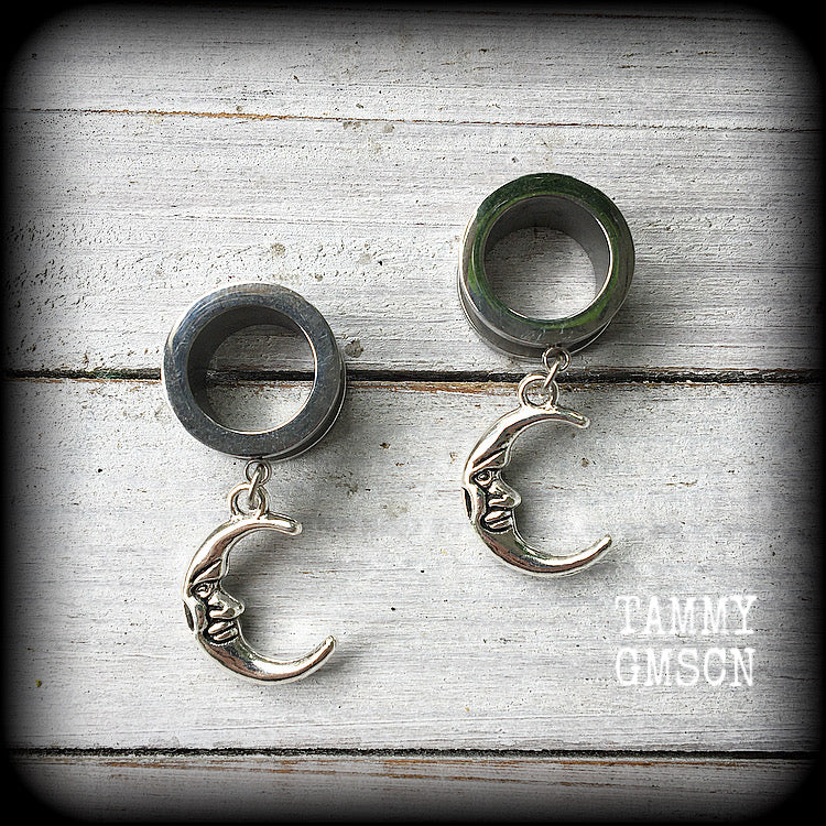 These gorgeous tunnel dangles feature whimsical antique silver crescent moons, are light weight, weighing in at 7 grams each and measure 4 cms from tip to tip.
This pair has been made with 9/16" (14mm) gauge surgical steel screw fit tunnels-suitable for stretched lobes.