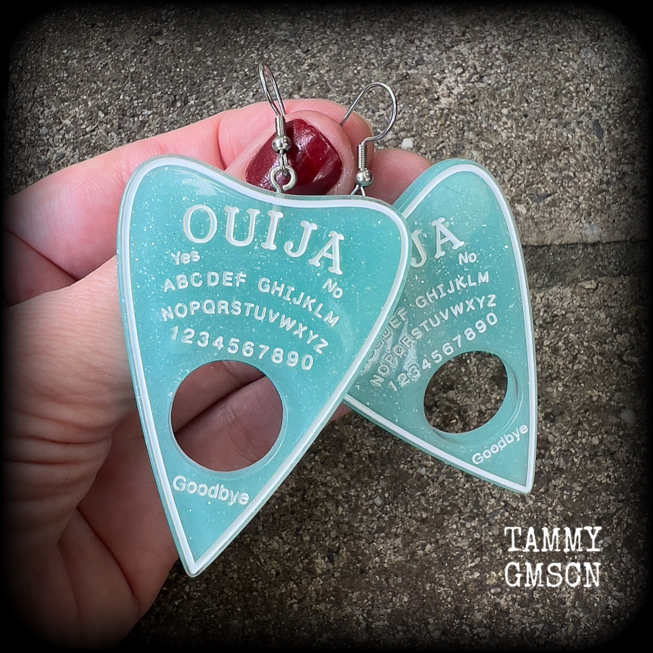 These gorgeous oversize baby blue pastel goth planchette earrings are big and dangly!!!
Weighing in at 8 grams each and measuring just under 8 cms from tip to tip.

This pair of earrings have been made on stainless steel french hooks, suitable for pierced ears.