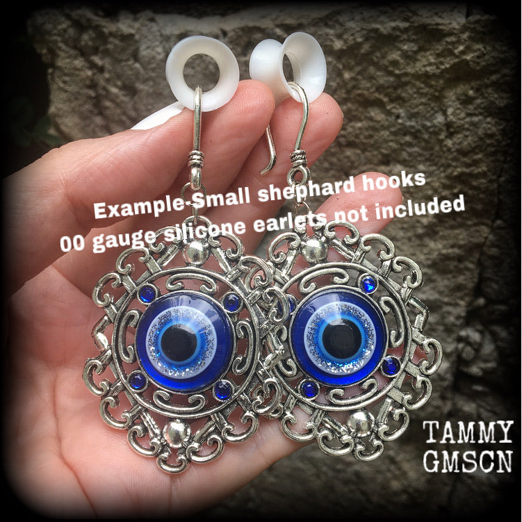 Evil eye earrings-Esoteric tunnel earrings