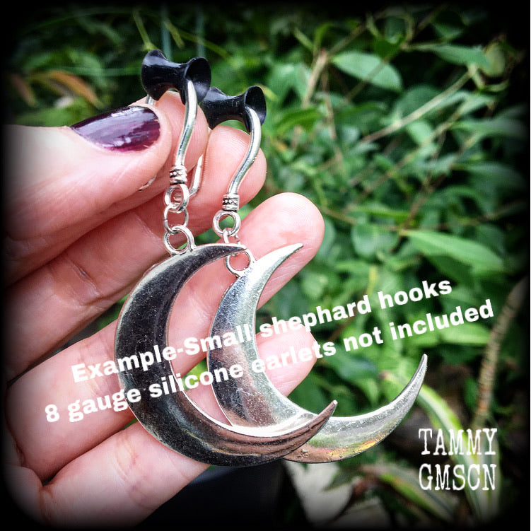 Crescent moon tunnel earrings