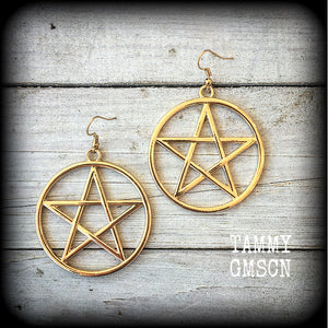 These are beautiful earrings feature large champagne gold pentagrams ,light weight (weighing only a few grams each) and nice and dangly, measuring just on 8cms from tip to tip.

This pair has been made on antique gold french hooks, suitable for pierced ears.