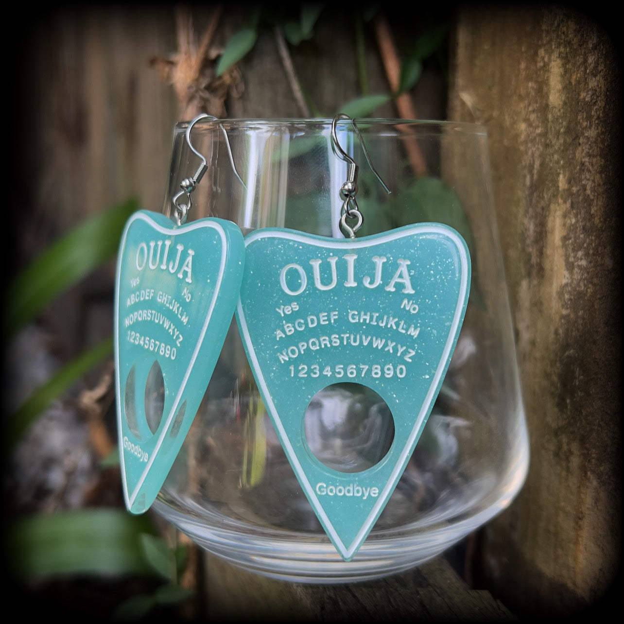These gorgeous oversize baby blue pastel goth planchette earrings are big and dangly!!!
Weighing in at 8 grams each and measuring just under 8 cms from tip to tip.

This pair of earrings have been made on stainless steel french hooks, suitable for pierced ears.